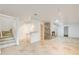 Finished basement with a brick fireplace, tile floors, and a bar area, perfect for entertaining at 1676 Moores Mill Nw Rd, Atlanta, GA 30327