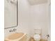 Elegant powder room with designer sink, modern fixtures, and neutral color palette at 1676 Moores Mill Nw Rd, Atlanta, GA 30327
