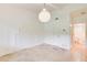 Neutral bedroom features tile floors, a modern light, and ample natural light at 1676 Moores Mill Nw Rd, Atlanta, GA 30327