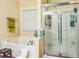 Bathroom featuring a shower and tub at 2606 Fairmont Park Ct, Dacula, GA 30019