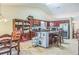 Open kitchen with granite counters, stainless steel appliances, and an island with bar seating at 2606 Fairmont Park Ct, Dacula, GA 30019
