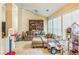 Cozy living room filled with natural light and featuring a comfortable sofa and toys at 2606 Fairmont Park Ct, Dacula, GA 30019