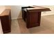 Finished basement with bar area features elegant wood cabinetry and counter seating at 4091 Oberon Se Ct, Smyrna, GA 30080