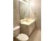 Bathroom featuring a single sink vanity with tiled floors at 4091 Oberon Se Ct, Smyrna, GA 30080