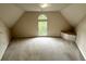 Upstairs bonus room with a window at 4091 Oberon Se Ct, Smyrna, GA 30080