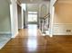 Spacious living room with hardwood floors, wainscoting and an abundance of natural light at 4091 Oberon Se Ct, Smyrna, GA 30080
