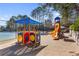 Community playground with colorful play structures, shaded area, and recreational opportunities at 4091 Oberon Se Ct, Smyrna, GA 30080