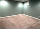 This room features neutral paint and trim, plus carpeted flooring at 4091 Oberon Se Ct, Smyrna, GA 30080