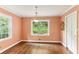 Dining room with hardwood floors, natural light and neutral wall color at 491 Hemlock Sw Dr, Marietta, GA 30064