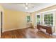 Bright home office features hardwood floors and a bay window overlooking the scenic outdoors at 491 Hemlock Sw Dr, Marietta, GA 30064