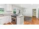 This kitchen features stainless steel appliances, hardwood floors, and natural light at 491 Hemlock Sw Dr, Marietta, GA 30064