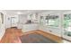 Bright room with access to an outdoor covered patio and hardwood flooring at 491 Hemlock Sw Dr, Marietta, GA 30064