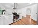 Well-equipped kitchen featuring stainless steel appliances, granite countertops, and a modern range hood at 2683 Stardust Trl, Decatur, GA 30034