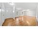 Bright and airy living room with gleaming hardwood floors and fresh white paint at 2683 Stardust Trl, Decatur, GA 30034