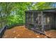 Spacious back deck with a screened porch that overlooks the backyard at 3270 Leslie Ne Ct, Atlanta, GA 30345