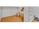 Finished basement with vinyl floor, storage, white walls, and decorative lighting at 3270 Leslie Ne Ct, Atlanta, GA 30345