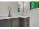 This lovely bathroom features a modern vanity with storage and a decorative mirror at 3270 Leslie Ne Ct, Atlanta, GA 30345