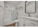 Modern bathroom with white subway tile shower and vanity with marble countertop at 3270 Leslie Ne Ct, Atlanta, GA 30345
