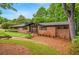 Brick exterior home with manicured lawn and mulch at 3270 Leslie Ne Ct, Atlanta, GA 30345