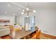 Bright open living area with hardwood floors, white walls, modern lighting, and a view to the living room at 3270 Leslie Ne Ct, Atlanta, GA 30345