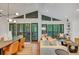 Open living space featuring a dining area, sliding doors to an outdoor deck, and modern decor at 3270 Leslie Ne Ct, Atlanta, GA 30345