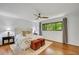 Relaxing main bedroom with hardwood floors, ceiling fan, and backyard views at 3270 Leslie Ne Ct, Atlanta, GA 30345