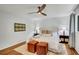 This inviting main bedroom boasts hardwood floors, a ceiling fan, and neutral decor at 3270 Leslie Ne Ct, Atlanta, GA 30345