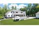 A beautiful backyard featuring a swimming pool, hot tub, screened porch, and lounging area at 604 Trinity Church Rd, Canton, GA 30115