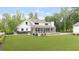 Expansive backyard showcasing a lush lawn and outdoor living space at 604 Trinity Church Rd, Canton, GA 30115