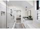 Elegant bathroom boasts a glass-enclosed shower and a sleek vanity with granite countertop at 604 Trinity Church Rd, Canton, GA 30115