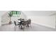 Versatile bonus room featuring a game table and an abundance of natural light at 604 Trinity Church Rd, Canton, GA 30115