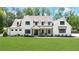 Stunning two-story white farmhouse with black trim, a sprawling lawn, and professionally landscaped gardens at 604 Trinity Church Rd, Canton, GA 30115