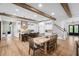 Open-concept kitchen with white cabinets, a large island, and stainless steel appliances at 604 Trinity Church Rd, Canton, GA 30115