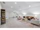 Large living room featuring a sloped ceiling, comfortable seating, and recessed lighting at 604 Trinity Church Rd, Canton, GA 30115