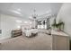 Bright and airy primary bedroom with large windows, tray ceiling, and plush carpet at 604 Trinity Church Rd, Canton, GA 30115