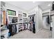 Spacious walk-in closet with custom shelving and ample storage at 604 Trinity Church Rd, Canton, GA 30115