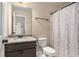 Bathroom featuring vanity, shower with curtain and natural light at 113 Osier Dr, Mcdonough, GA 30252