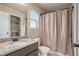 Bathroom featuring vanity, shower with curtain and natural light at 113 Osier Dr, Mcdonough, GA 30252