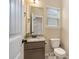 Cozy bathroom with granite counters and natural light at 113 Osier Dr, Mcdonough, GA 30252
