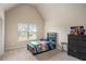 Well-lit bedroom featuring a bed and large window at 113 Osier Dr, Mcdonough, GA 30252