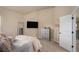 Well-lit bedroom featuring a comfortable bed and ample natural light at 113 Osier Dr, Mcdonough, GA 30252