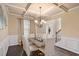 Elegant dining room featuring coffered ceiling and modern chandelier at 113 Osier Dr, Mcdonough, GA 30252
