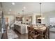 Spacious kitchen featuring a large island, stainless appliances, and an eat-in area at 113 Osier Dr, Mcdonough, GA 30252