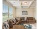 Cozy living room with a comfortable sectional sofa and coffered ceiling at 113 Osier Dr, Mcdonough, GA 30252