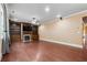 Bright living room boasts hardwood floors, built-in bookshelves, and a cozy fireplace at 1340 Delo Ln, Cumming, GA 30041