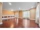 Formal living room showcasing hardwood floors and decorative wall trim at 1340 Delo Ln, Cumming, GA 30041