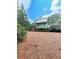 Expansive backyard featuring a multi-level deck, lush greenery, and a peaceful setting, perfect for outdoor enjoyment at 139 Grandmar Chase, Canton, GA 30115