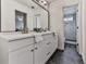 Modern bathroom vanity with double sinks and a view to a shower at 139 Grandmar Chase, Canton, GA 30115