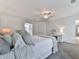 Spacious bedroom with soft carpet, ceiling fan, and modern decor at 139 Grandmar Chase, Canton, GA 30115