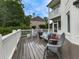 Spacious deck with comfortable seating and a view of the surrounding greenery at 139 Grandmar Chase, Canton, GA 30115